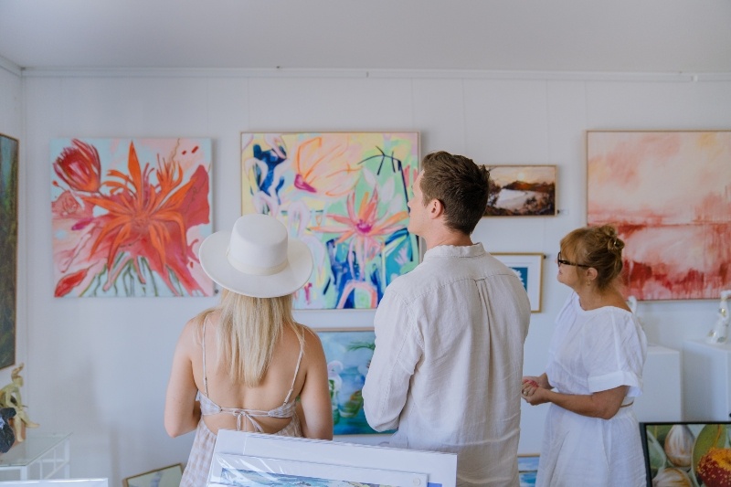 People looking at artwork in gallery
