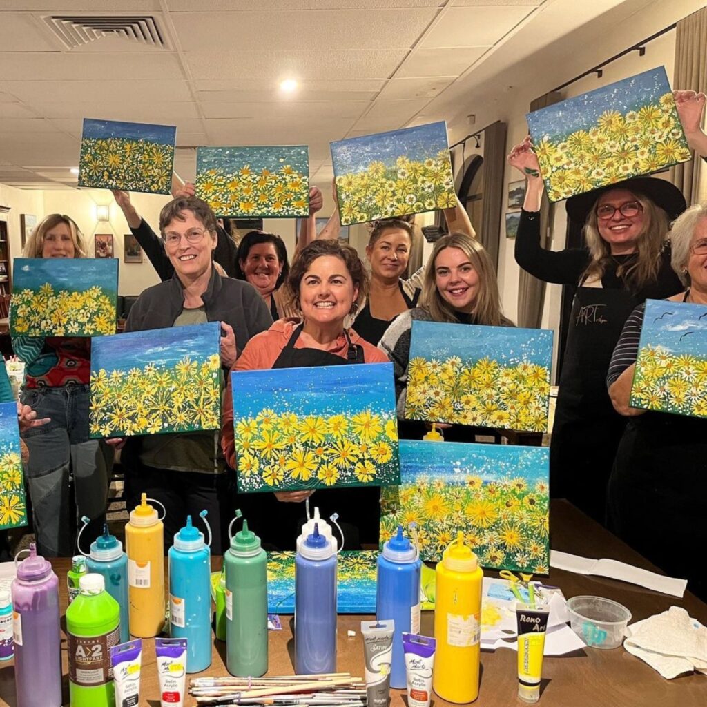 group at paint and sip art class