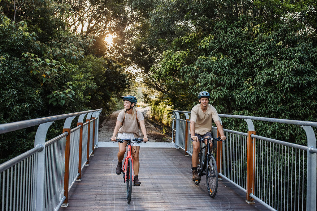 couple on bikes on the Northern Rivers Rail Trail