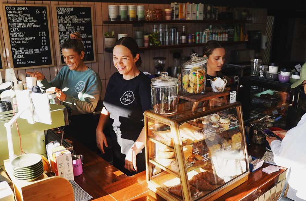 Smiling cafe staff at The Brew and Bake Co